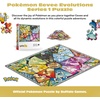 image:imageBuffalo Games Pokmon Eevee Evolutions Series 1 Jigsaw Puzzle  500 Piece Puzzle 2125 x 15 in  Precision Cut Pieces  Bonus Reference Poster  Eevee Evolutions Artwork with Sylveon amp UmbreonEevees Stained Glass