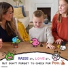 image:imageTamagotchi Card Game for Kids amp Families 8  24 Player Strategy amp Set Collection Game  Evolve Your Tamagotchi  Family Card Game Night  Official Tamagotchi Game from Buffalo Games